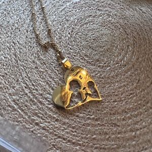 Beautiful mom and baby necklace - silver and gold make the perfect present